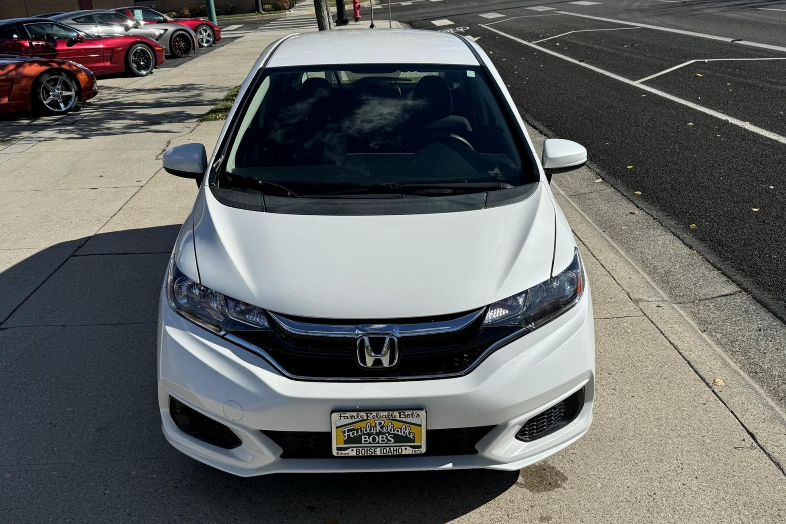 2019 White /Black Honda Fit LX (3HGGK5H4XKM) with an 4 Cyl 1.5 Liter engine, Automatic transmission, located at 2304 W. Main St., Boise, ID, 83702, (208) 342-7777, 43.622105, -116.218658 - Only 18k Miles! - Photo#3