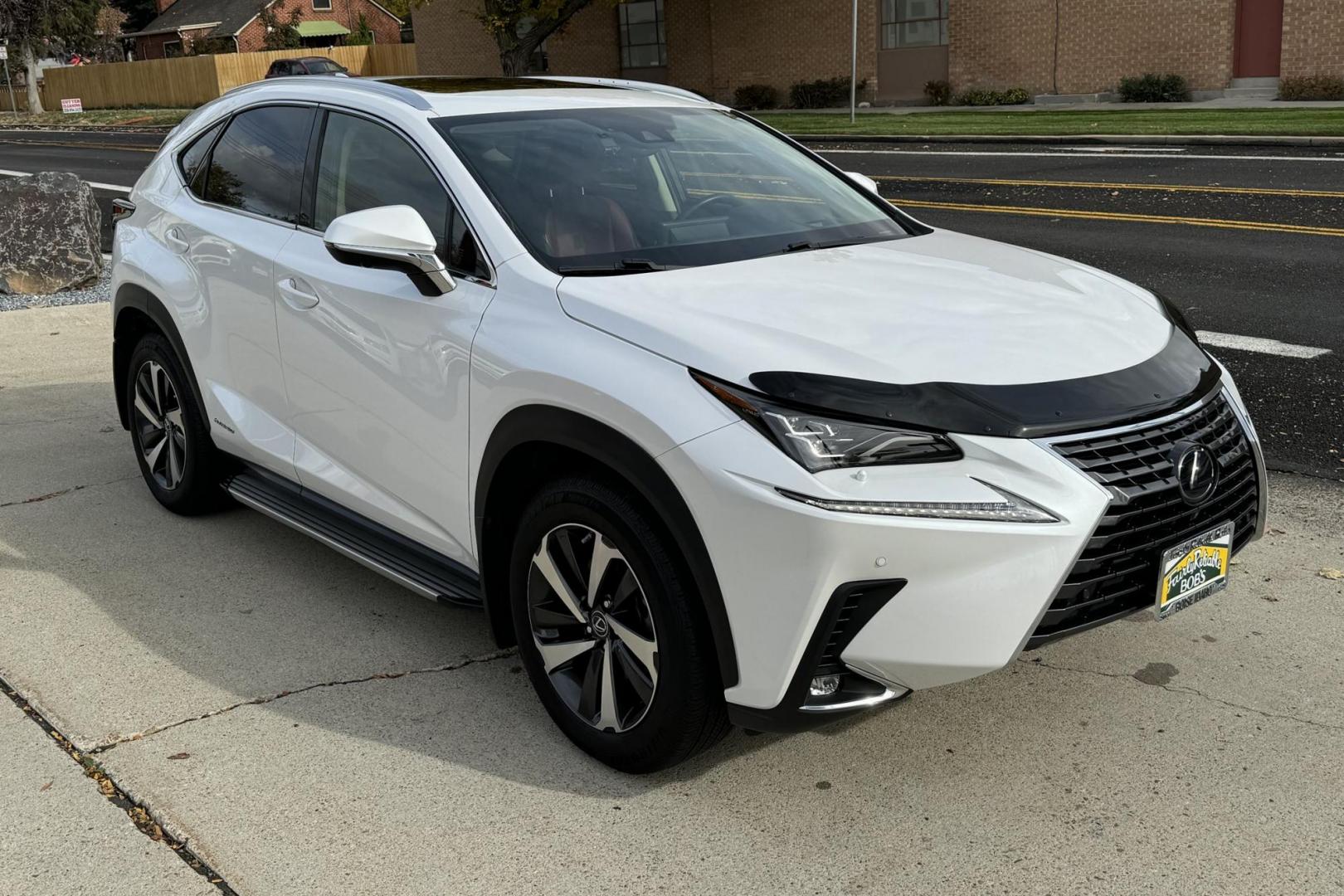 2020 Eminent White Pearl /Red Lexus NX 300H Luxury (JTJHJRDZ4L5) with an 4 Cyl 2.5 Liter Hybrid engine, Automatic transmission, located at 2304 W. Main St., Boise, ID, 83702, (208) 342-7777, 43.622105, -116.218658 - Great Fuel Economy! Amazing Comfort! - Photo#2