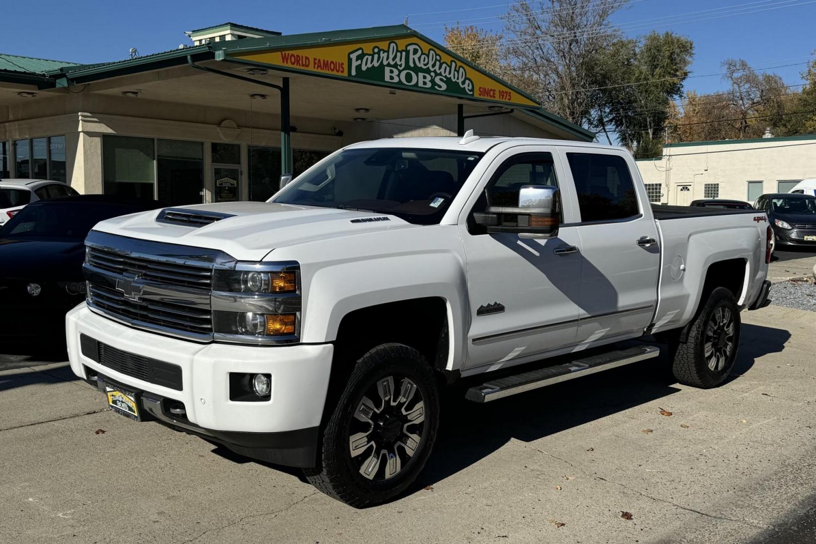 2017 Summit White /Havana Brown Chevrolet Silverado 3500HD High Country (1GC4K1EY9HF) with an V8 6.6 Liter Turbo Diesel engine, Automatic 6 Speed transmission, located at 2304 W. Main St., Boise, ID, 83702, (208) 342-7777, 43.622105, -116.218658 - Ready To Work! New Tires Too! - Photo#0