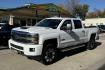 2017 Summit White /Havana Brown Chevrolet Silverado 3500HD High Country (1GC4K1EY9HF) with an V8 6.6 Liter Turbo Diesel engine, Automatic 6 Speed transmission, located at 2304 W. Main St., Boise, ID, 83702, (208) 342-7777, 43.622105, -116.218658 - Ready To Work! New Tires Too! - Photo#0