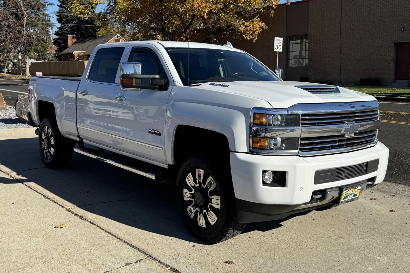 2017 Summit White /Havana Brown Chevrolet Silverado 3500HD High Country (1GC4K1EY9HF) with an V8 6.6 Liter Turbo Diesel engine, Automatic 6 Speed transmission, located at 2304 W. Main St., Boise, ID, 83702, (208) 342-7777, 43.622105, -116.218658 - Ready To Work! New Tires Too! - Photo#1