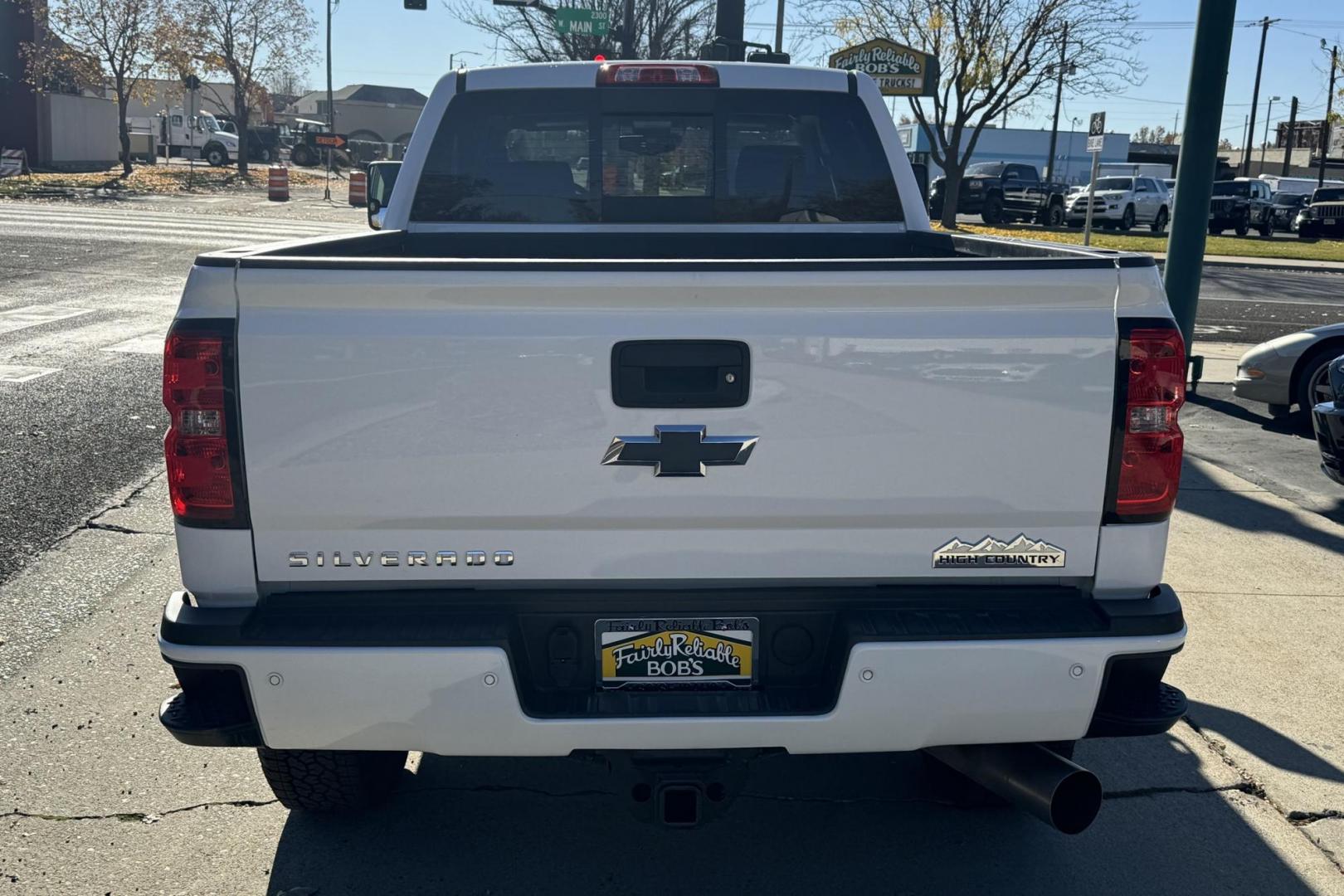 2017 Summit White /Havana Brown Chevrolet Silverado 3500HD High Country (1GC4K1EY9HF) with an V8 6.6 Liter Turbo Diesel engine, Automatic 6 Speed transmission, located at 2304 W. Main St., Boise, ID, 83702, (208) 342-7777, 43.622105, -116.218658 - Ready To Work! New Tires Too! - Photo#2