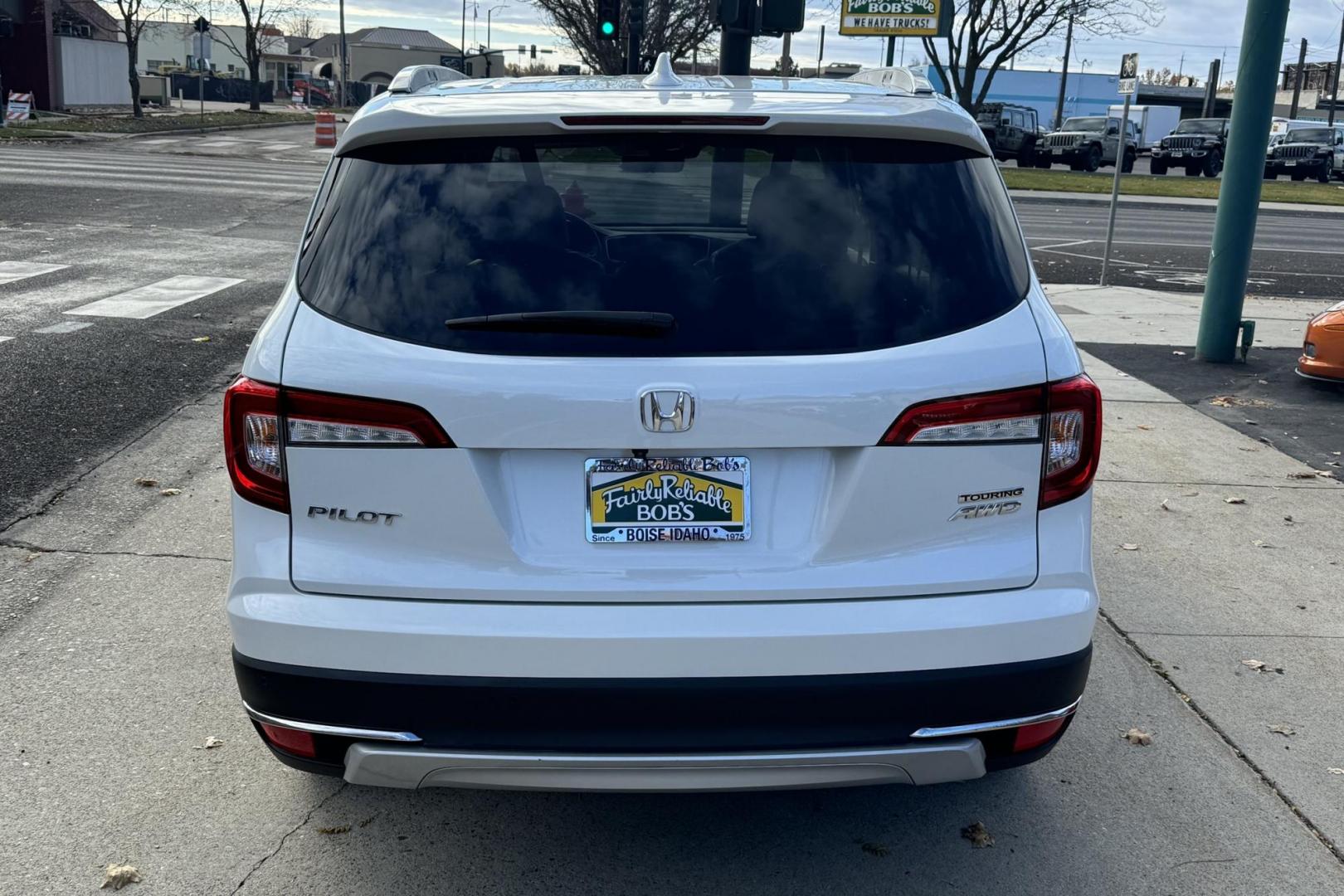 2021 Platinum White Pearl /Black Honda Pilot Touring (5FNYF6H96MB) with an V6 3.5 Liter engine, Automatic 9 Speed transmission, located at 2304 W. Main St., Boise, ID, 83702, (208) 342-7777, 43.622105, -116.218658 - Photo#3