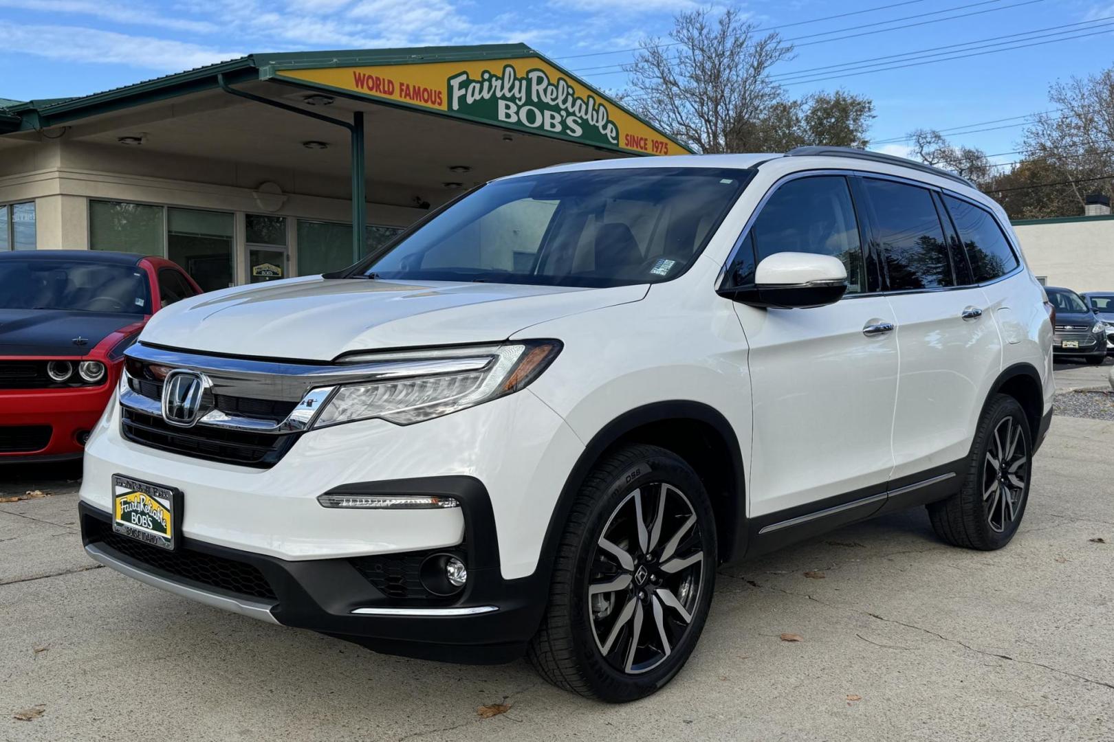 2021 Platinum White Pearl /Black Honda Pilot Touring (5FNYF6H96MB) with an V6 3.5 Liter engine, Automatic 9 Speed transmission, located at 2304 W. Main St., Boise, ID, 83702, (208) 342-7777, 43.622105, -116.218658 - Photo#0