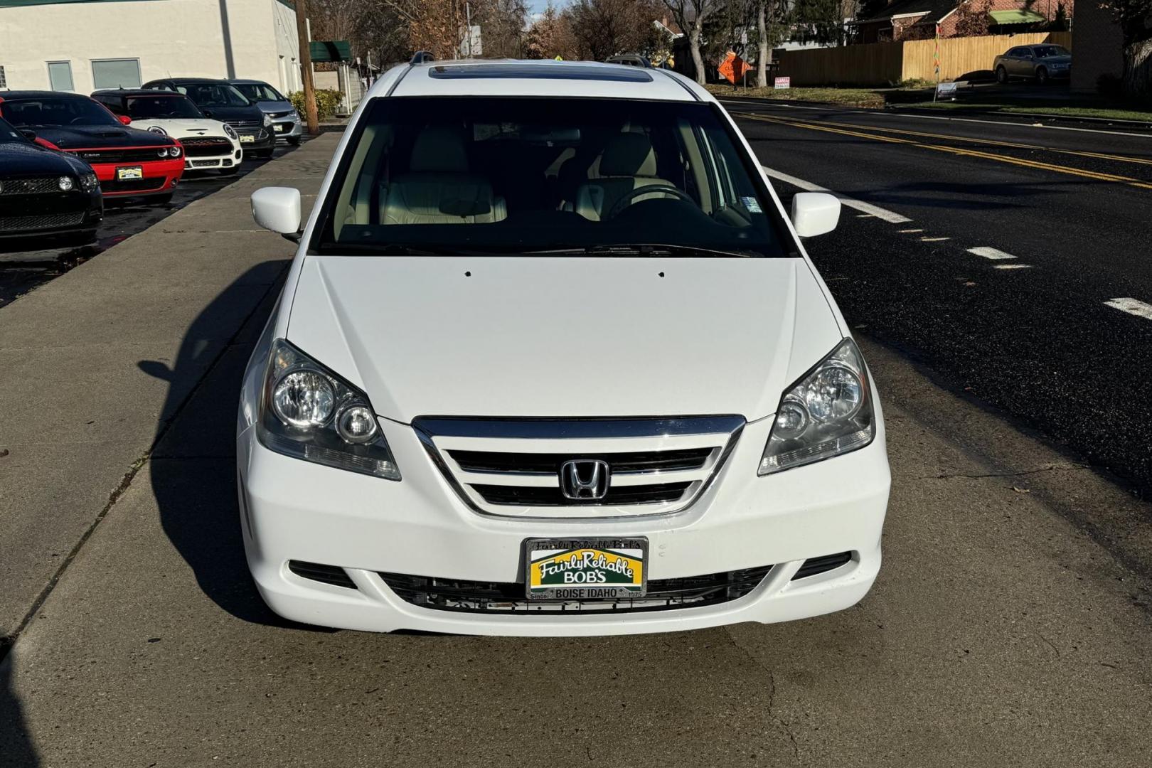 2007 White /Tan Honda Odyssey EX-L (5FNRL386X7B) with an V6 3.5 Liter engine, Automatic transmission, located at 2304 W. Main St., Boise, ID, 83702, (208) 342-7777, 43.622105, -116.218658 - One Owner with incredibly low mileage! Must see to appreciate! - Photo#2