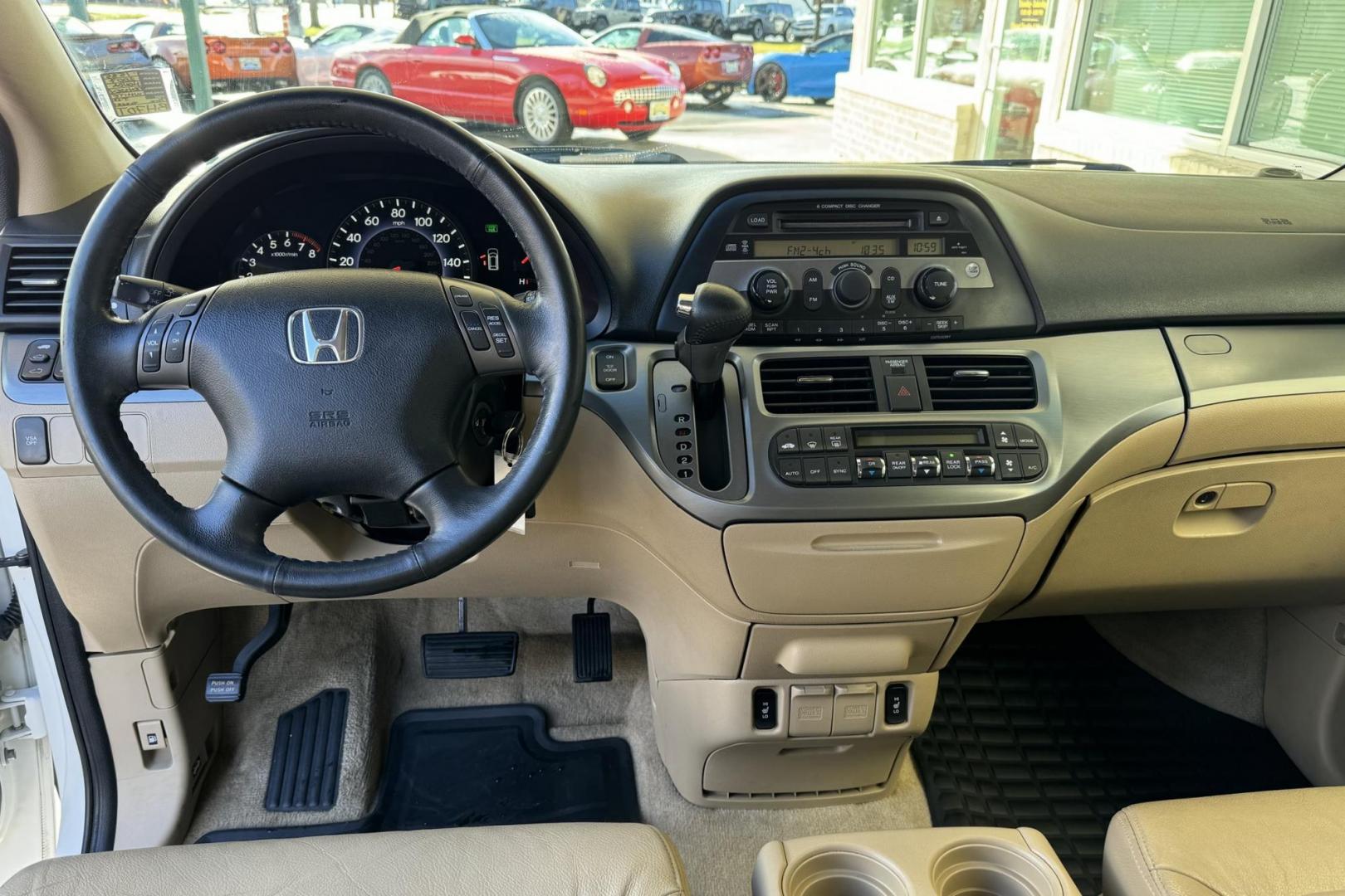 2007 White /Tan Honda Odyssey EX-L (5FNRL386X7B) with an V6 3.5 Liter engine, Automatic transmission, located at 2304 W. Main St., Boise, ID, 83702, (208) 342-7777, 43.622105, -116.218658 - One Owner with incredibly low mileage! Must see to appreciate! - Photo#7