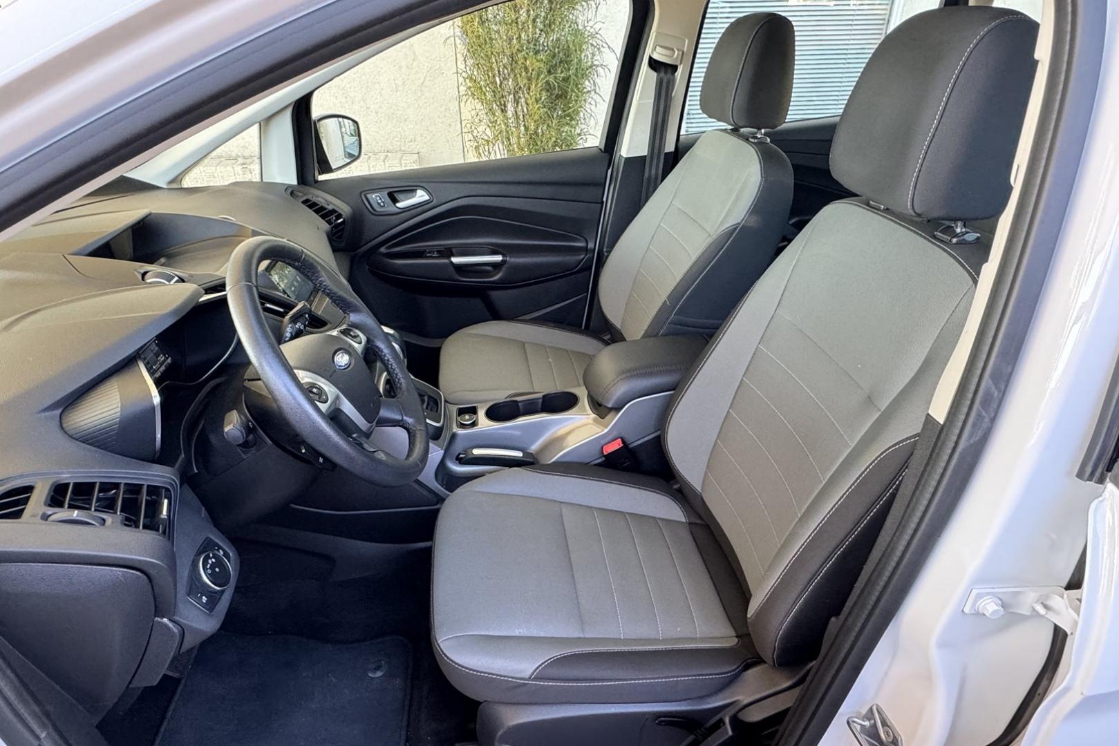 2016 Oxford White /Gray Ford C-Max Hybrid SE (1FADP5AU2GL) with an 4 Cyl 2.0 Liter Hybrid engine, Automatic transmission, located at 2304 W. Main St., Boise, ID, 83702, (208) 342-7777, 43.622105, -116.218658 - Updated JVC Head Unit! Power Rear Liftgate! Apple Car Play! - Photo#10