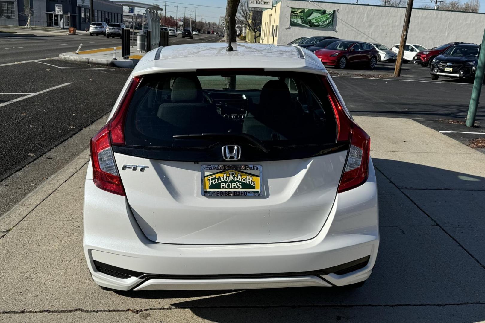 2019 White /Black Honda Fit LX (3HGGK5H42KM) with an 4 Cyl 1.5 Liter engine, Automatic transmission, located at 2304 W. Main St., Boise, ID, 83702, (208) 342-7777, 43.622105, -116.218658 - Photo#1