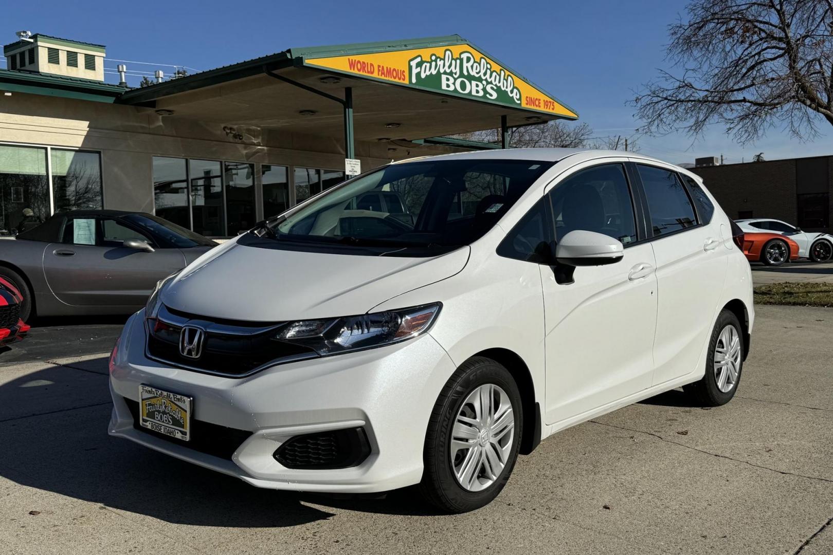 2019 White /Black Honda Fit LX (3HGGK5H42KM) with an 4 Cyl 1.5 Liter engine, Automatic transmission, located at 2304 W. Main St., Boise, ID, 83702, (208) 342-7777, 43.622105, -116.218658 - Photo#0