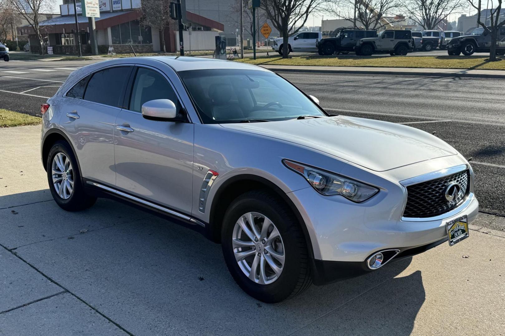 2017 Silver /Black Infiniti QX70 (JN8CS1MW0HM) with an V6 3.7 Liter engine, Automatic 7 Speed w/ Rev Match transmission, located at 2304 W. Main St., Boise, ID, 83702, (208) 342-7777, 43.622105, -116.218658 - All Wheel Drive Luxury! - Photo#2