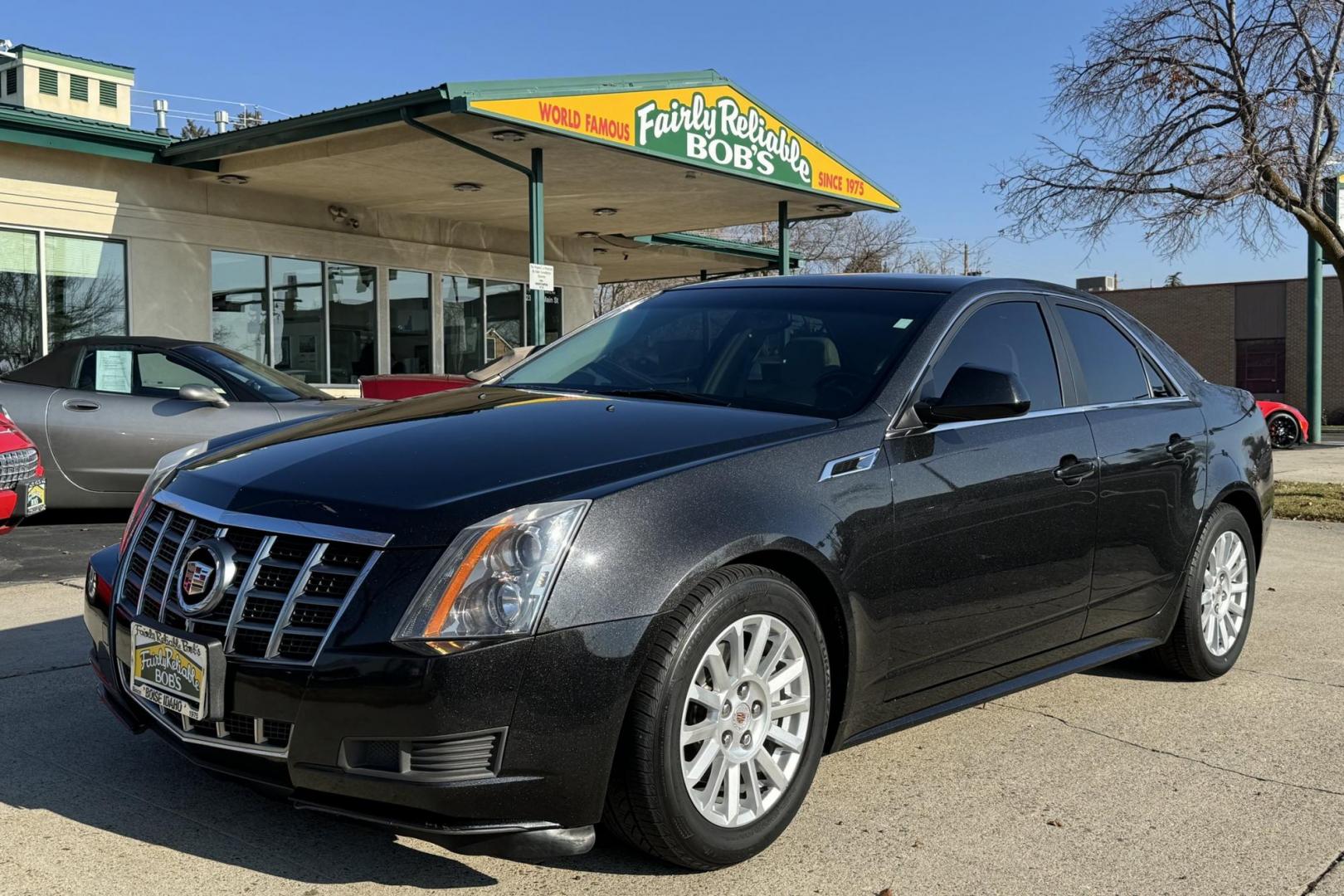 2012 Black Diamond Tricoat /Light Titanium w/ Ebony Accents Cadillac CTS (1G6DA5E57C0) with an V6 3.0 Liter engine, Automatic 6 Speed transmission, located at 2304 W. Main St., Boise, ID, 83702, (208) 342-7777, 43.622105, -116.218658 - Clean Car With Luxury To Spare! - Photo#0