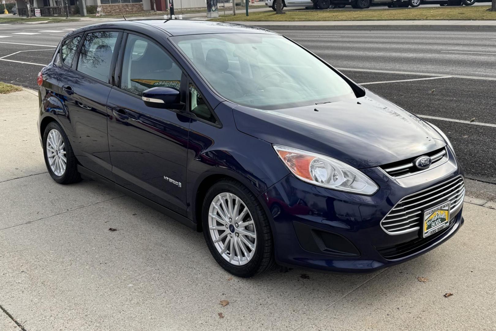 2016 Kona Blue /Gray Ford C-Max Hybrid SE (1FADP5AU5GL) with an 4 Cyl 2.0 Liter Hybrid engine, Automatic transmission, located at 2304 W. Main St., Boise, ID, 83702, (208) 342-7777, 43.622105, -116.218658 - Photo#1