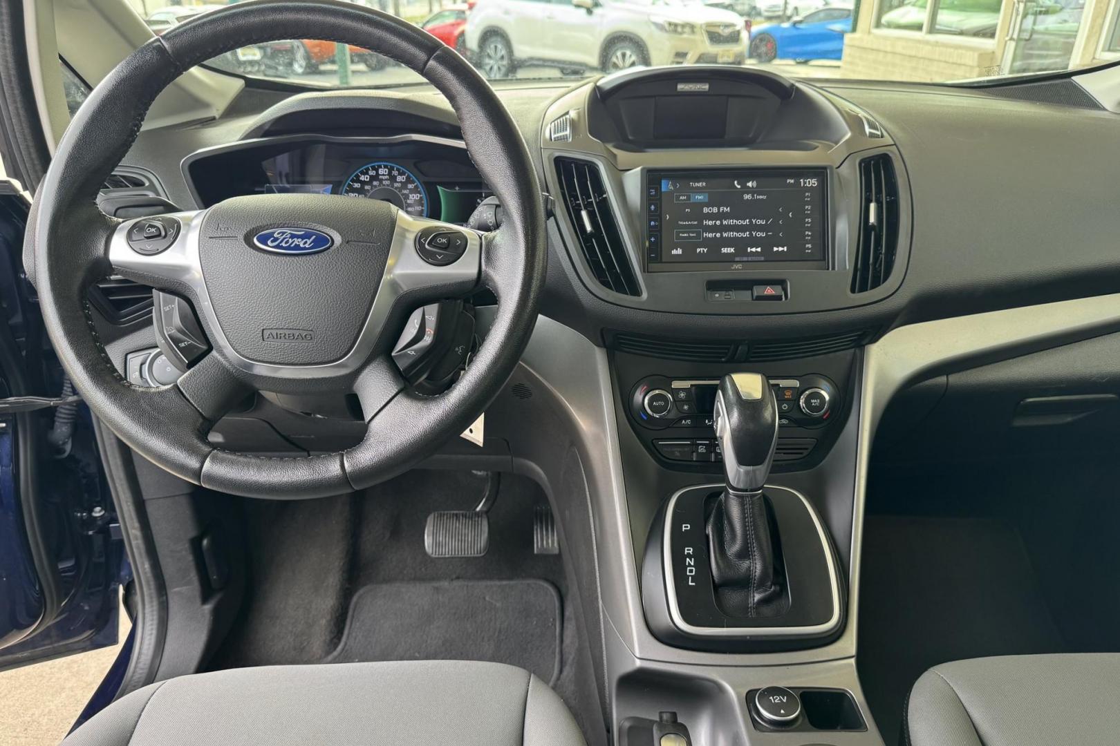 2016 Kona Blue /Gray Ford C-Max Hybrid SE (1FADP5AU5GL) with an 4 Cyl 2.0 Liter Hybrid engine, Automatic transmission, located at 2304 W. Main St., Boise, ID, 83702, (208) 342-7777, 43.622105, -116.218658 - Photo#7