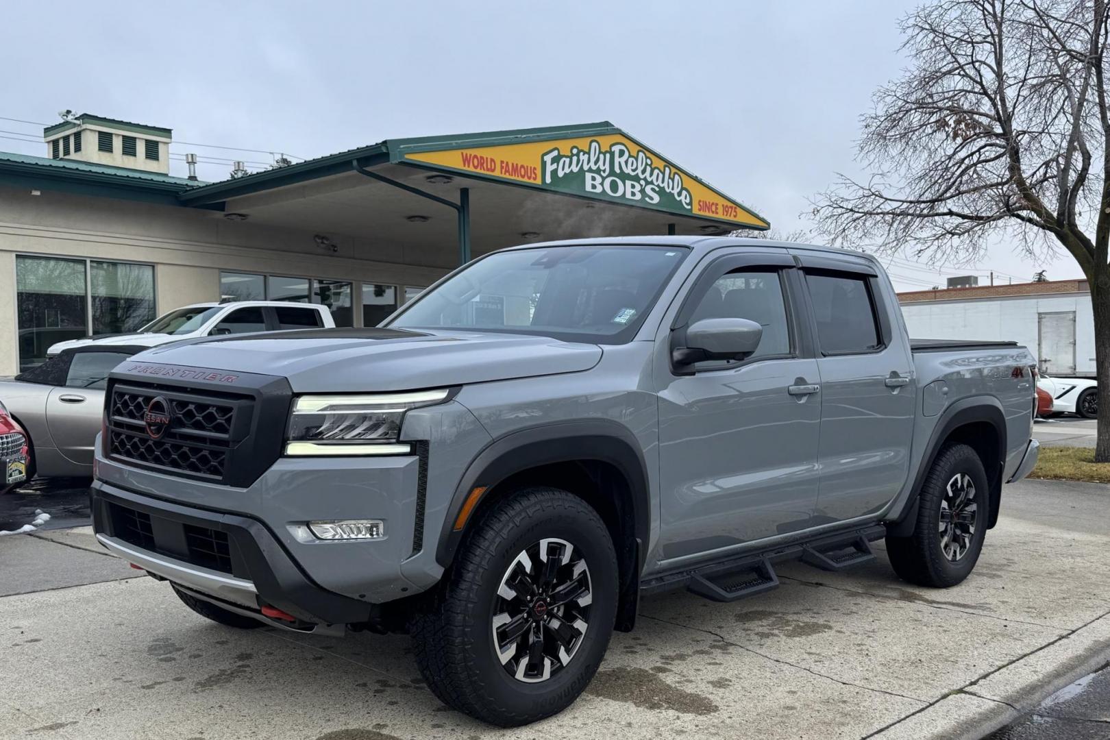 2022 Boulder Gray Pearl /Black Nissan Frontier PRO-4X (1N6ED1EK7NN) with an V6 3.8 Liter engine, Automatic 9 Speed transmission, located at 2304 W. Main St., Boise, ID, 83702, (208) 342-7777, 43.622105, -116.218658 - Remaining Factory Warranty! Huge Value For The Money! - Photo#0