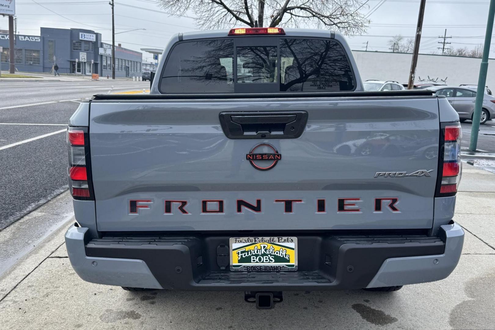 2022 Boulder Gray Pearl /Black Nissan Frontier PRO-4X (1N6ED1EK7NN) with an V6 3.8 Liter engine, Automatic 9 Speed transmission, located at 2304 W. Main St., Boise, ID, 83702, (208) 342-7777, 43.622105, -116.218658 - Remaining Factory Warranty! Huge Value For The Money! - Photo#1