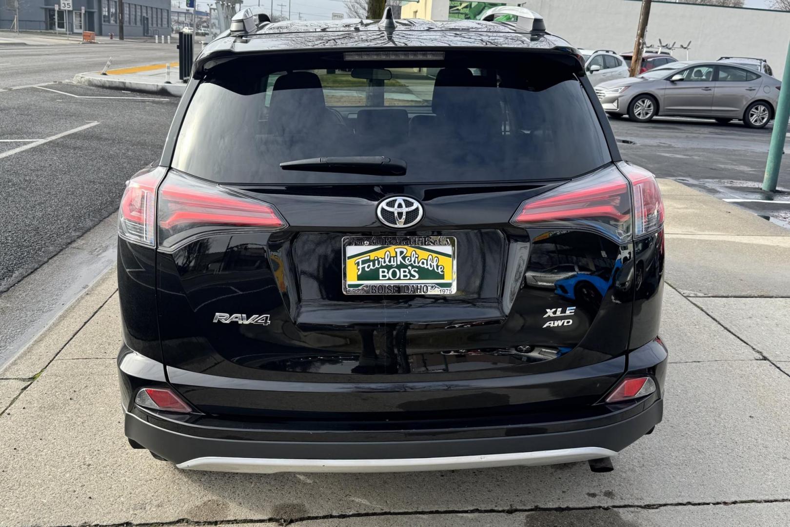 2016 Black /Black/Gray Toyota RAV4 XLE (2T3RFREV2GW) with an 4 Cyl 2.5 Liter engine, Automatic 6 Speed transmission, located at 2304 W. Main St., Boise, ID, 83702, (208) 342-7777, 43.622105, -116.218658 - Nicely Optioned RAV4 All Wheel Drive! - Photo#2