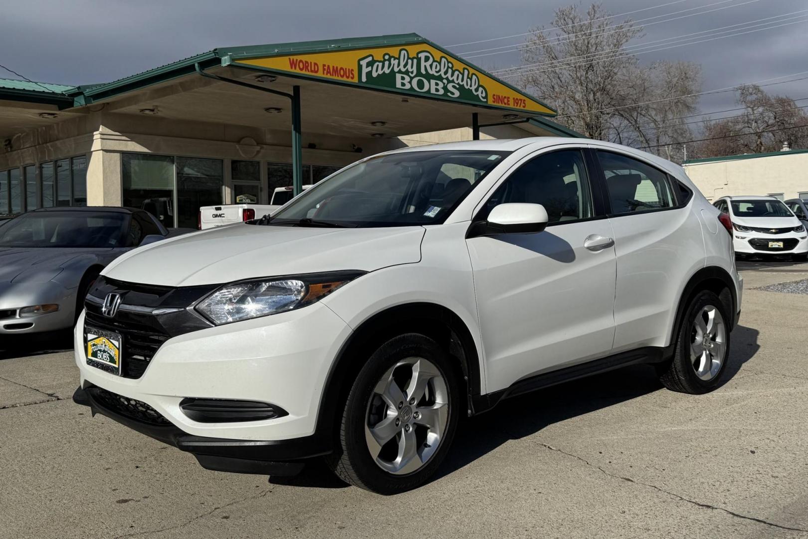 2016 White /Gray Honda HR-V LX (3CZRU6H32GM) with an 4 Cyl 1.8 Liter engine, Automatic transmission, located at 2304 W. Main St., Boise, ID, 83702, (208) 342-7777, 43.622105, -116.218658 - Great Fuel Economy And All Wheel Drive! - Photo#0