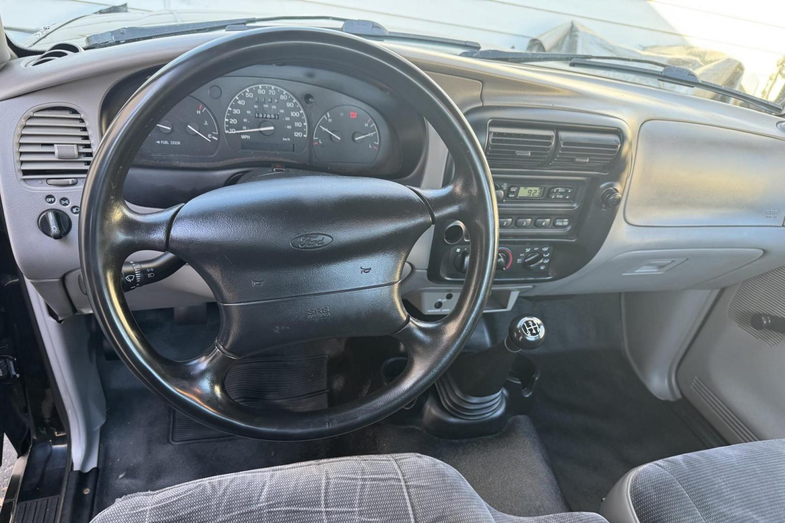 2000 Black /Gray Ford Ranger XL (1FTYR10C1YP) with an 4 Cyl 2.5 Liter engine, 5 Speed Manual transmission, located at 2304 W. Main St., Boise, ID, 83702, (208) 342-7777, 43.622105, -116.218658 - Manual Transmission, 2 wheel Drive! Great Yard Work Truck! - Photo#8