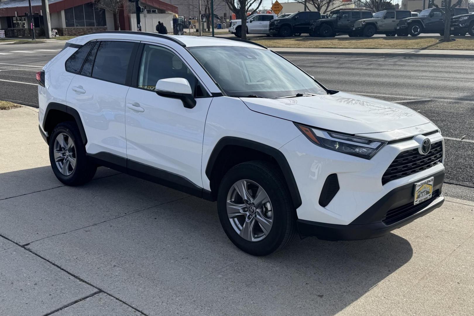 2024 Ice Cap White /Black Toyota RAV4 XLE (2T3P1RFV4RW) with an 4 Cyl 2.5 Liter engine, Automatic 8 Speed transmission, located at 2304 W. Main St., Boise, ID, 83702, (208) 342-7777, 43.622105, -116.218658 - Remaining Factory Warranty! Wireless Apple Car Play/Android Auto Too! - Photo#2