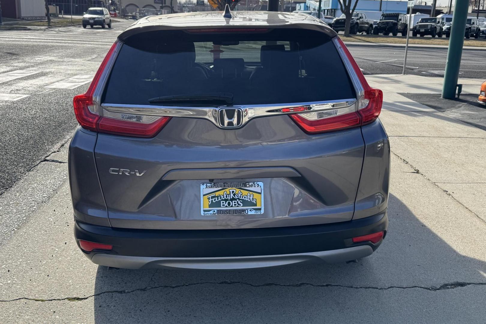 2018 Modern Steel Metallic /Light Gray Honda CR-V EX-L (7FARW1H82JE) with an 4 Cyl 1.5 Liter Turbo engine, Automatic transmission, located at 2304 W. Main St., Boise, ID, 83702, (208) 342-7777, 43.622105, -116.218658 - Photo#1