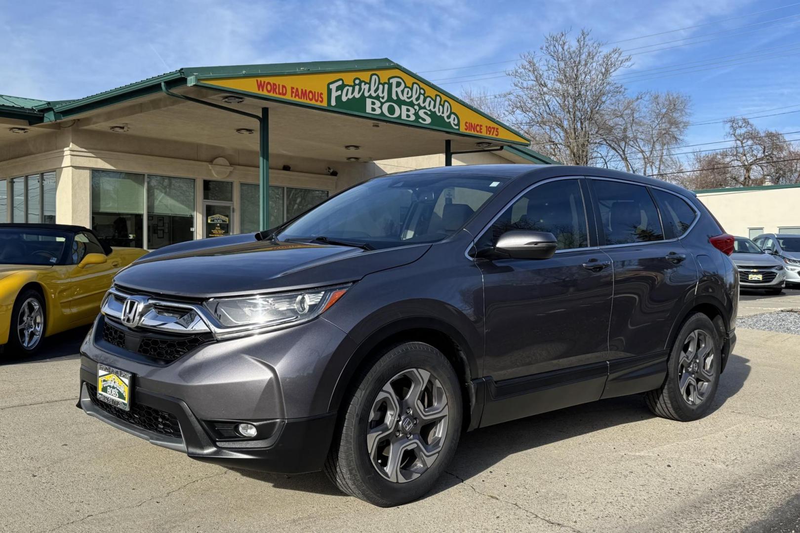 2018 Modern Steel Metallic /Light Gray Honda CR-V EX-L (7FARW1H82JE) with an 4 Cyl 1.5 Liter Turbo engine, Automatic transmission, located at 2304 W. Main St., Boise, ID, 83702, (208) 342-7777, 43.622105, -116.218658 - Photo#0