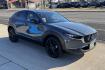 2024 Polymetal Gray Metallic /Red Leather Mazda CX-30 2.5 S Carbon Edition (3MVDMBCM4RM) with an 4 Cyl 2.5 Liter engine, Automatic 6 Speed transmission, located at 2304 W. Main St., Boise, ID, 83702, (208) 342-7777, 43.622105, -116.218658 - A lot of remaining factory warranty! New Tires Too! - Photo#2