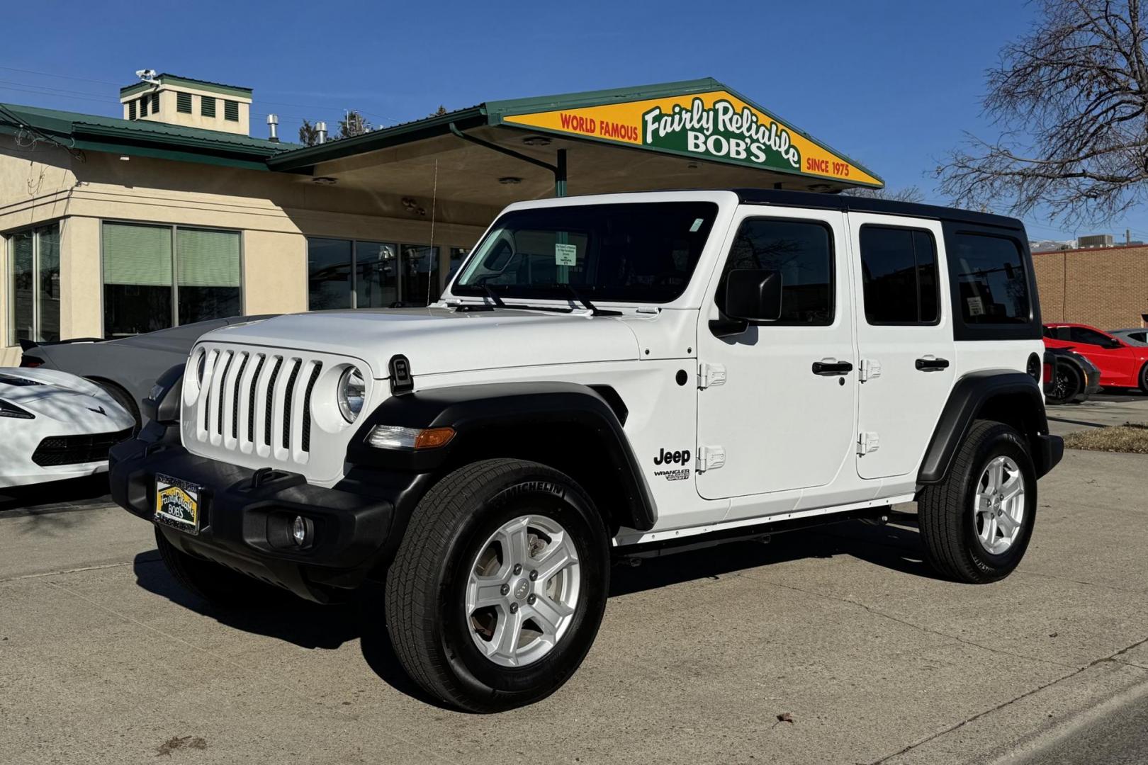 2021 White /Black Jeep Wrangler Unlimited Sport Sport (1C4HJXDGXMW) with an V6 3.6 Liter engine, Automatic 8 Speed transmission, located at 2304 W. Main St., Boise, ID, 83702, (208) 342-7777, 43.622105, -116.218658 - Ready To Play! - Photo#0