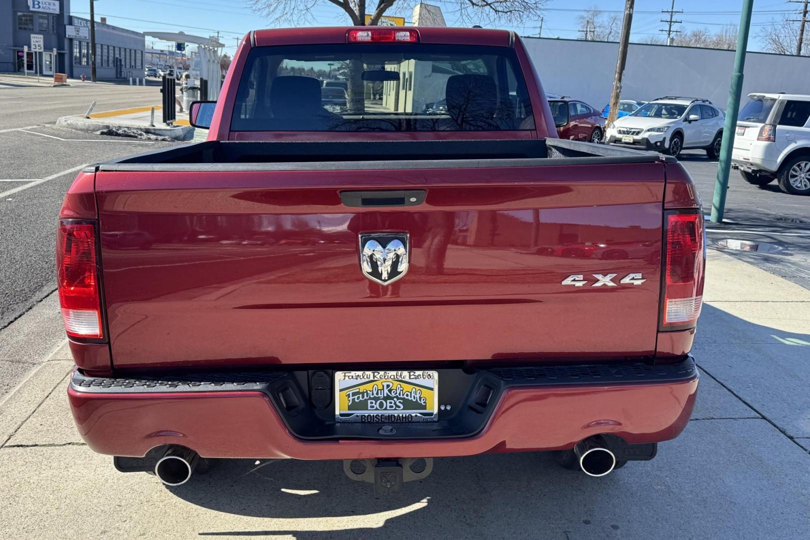 2012 Maroon /Black RAM 1500 Express (3C6JD7AT6CG) with an V8 5.7 Liter Hemi engine, Automatic transmission, located at 2304 W. Main St., Boise, ID, 83702, (208) 342-7777, 43.622105, -116.218658 - Hard To Find Regular Cab Short Box 4x4! - Photo#1