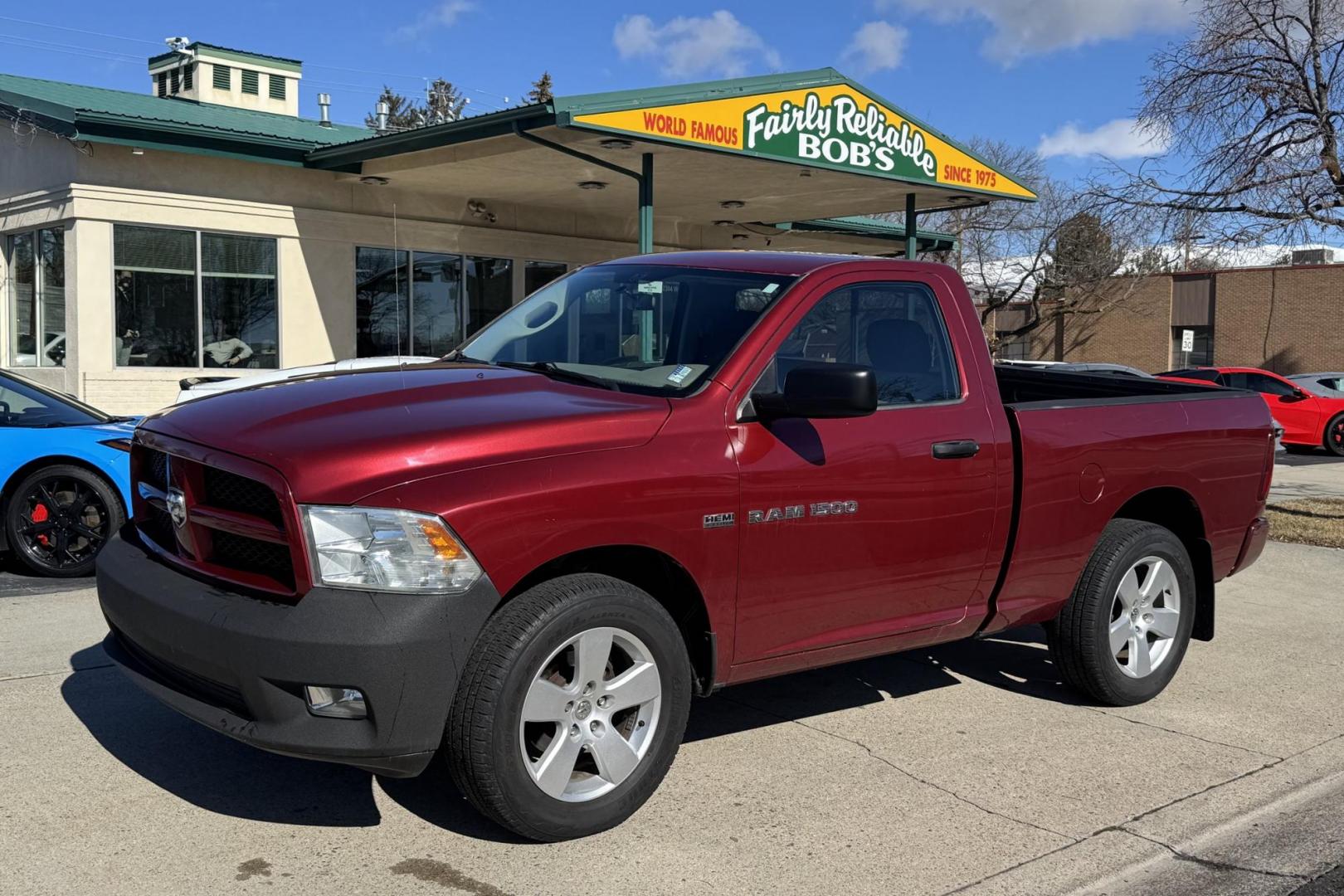 2012 Maroon /Black RAM 1500 Express (3C6JD7AT6CG) with an V8 5.7 Liter Hemi engine, Automatic transmission, located at 2304 W. Main St., Boise, ID, 83702, (208) 342-7777, 43.622105, -116.218658 - Hard To Find Regular Cab Short Box 4x4! - Photo#0