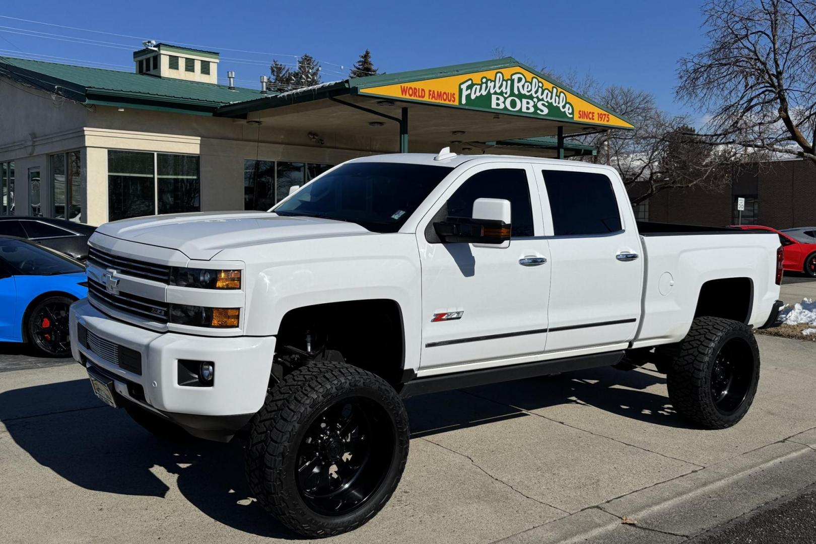 2015 Summit White /Jet Black Chevrolet Silverado 2500HD LTZ (1GC1KWE8XFF) with an V8 6.6 Liter Turbo Duramax Diesel engine, Automatic 6 Speed With Overdrive Allison transmission, located at 2304 W. Main St., Boise, ID, 83702, (208) 342-7777, 43.622105, -116.218658 - Low Mileage And Clean! - Photo#0