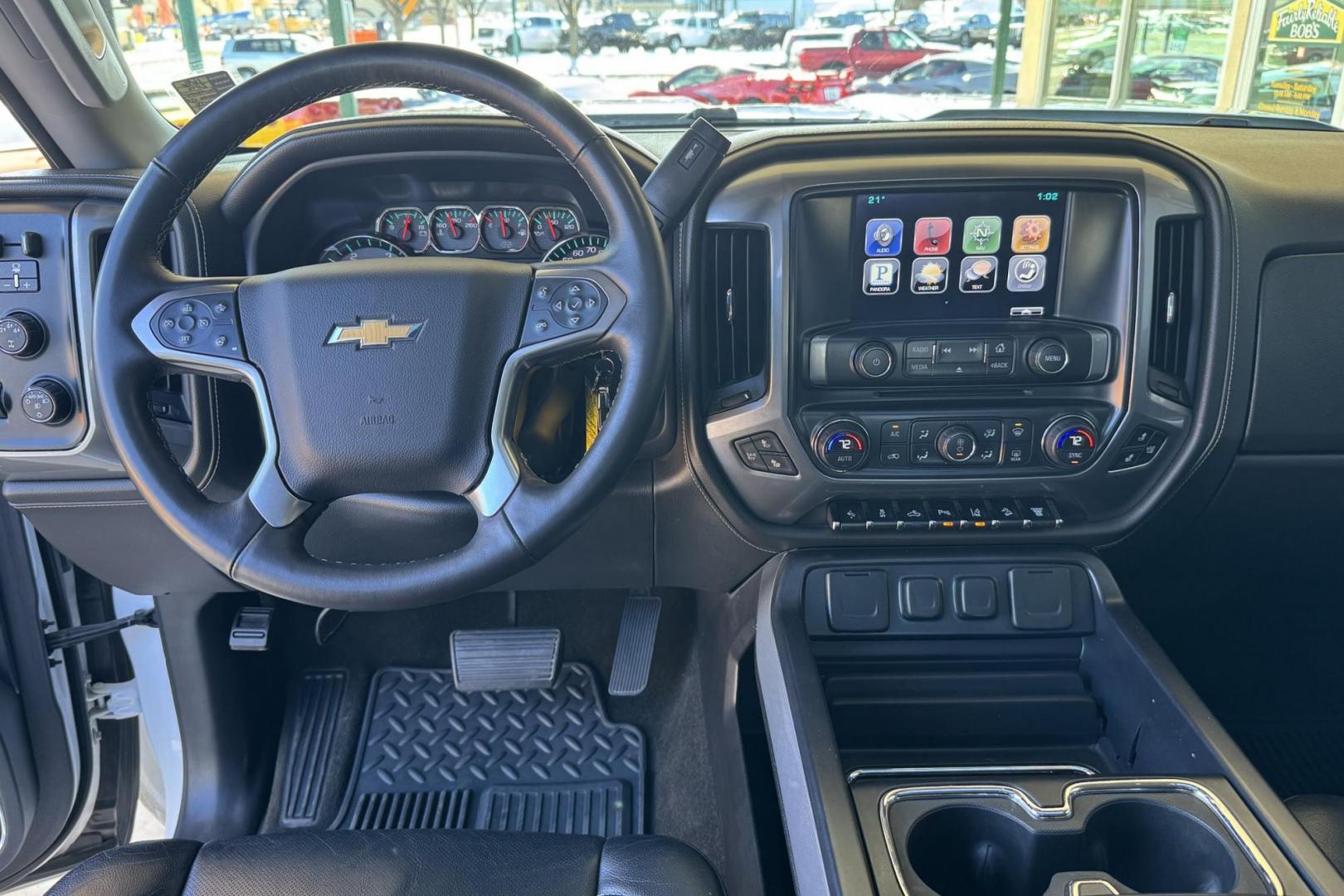 2015 Summit White /Jet Black Chevrolet Silverado 2500HD LTZ (1GC1KWE8XFF) with an V8 6.6 Liter Turbo Duramax Diesel engine, Automatic 6 Speed With Overdrive Allison transmission, located at 2304 W. Main St., Boise, ID, 83702, (208) 342-7777, 43.622105, -116.218658 - Low Mileage And Clean! - Photo#17