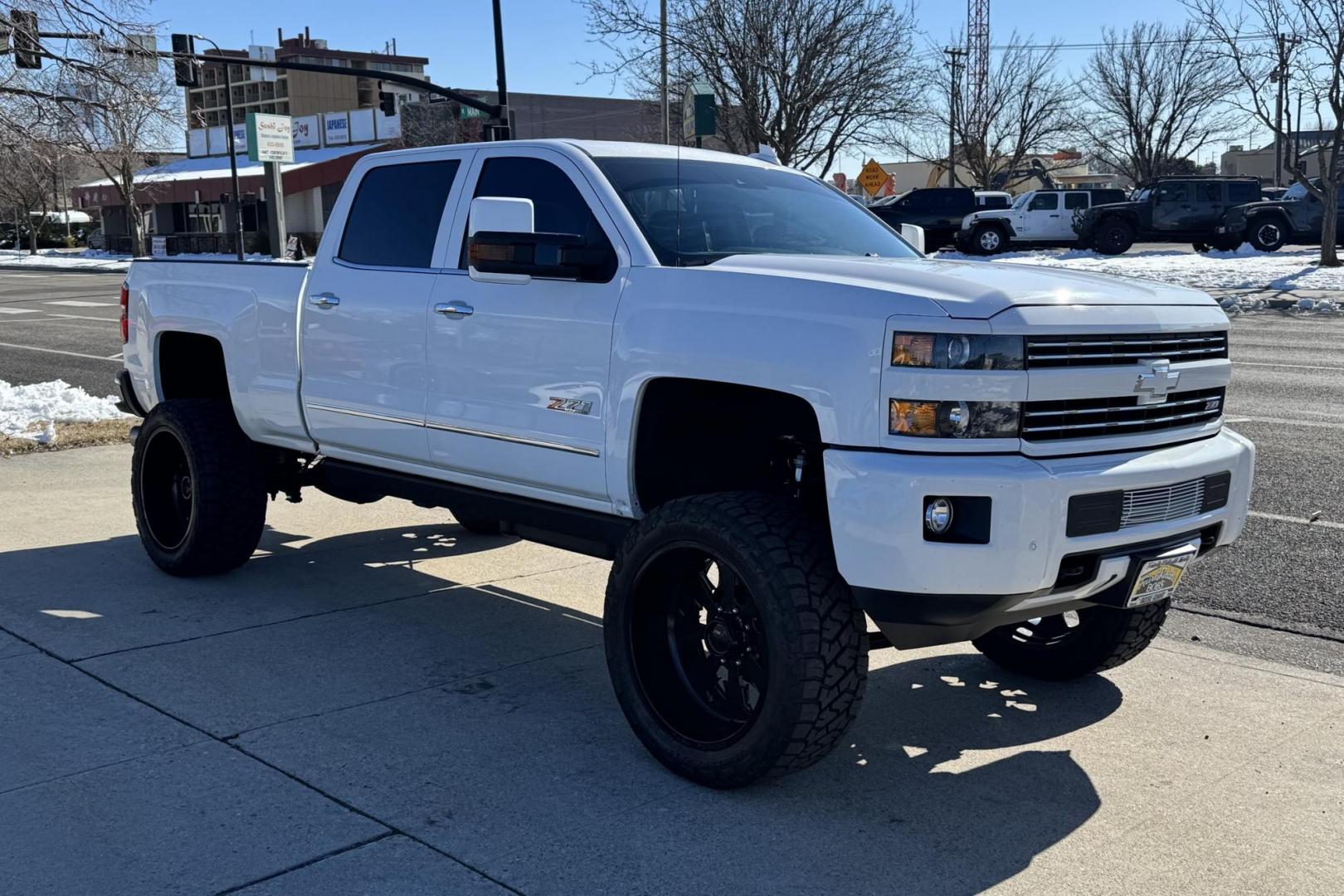 2015 Summit White /Jet Black Chevrolet Silverado 2500HD LTZ (1GC1KWE8XFF) with an V8 6.6 Liter Turbo Duramax Diesel engine, Automatic 6 Speed With Overdrive Allison transmission, located at 2304 W. Main St., Boise, ID, 83702, (208) 342-7777, 43.622105, -116.218658 - Low Mileage And Clean! - Photo#2