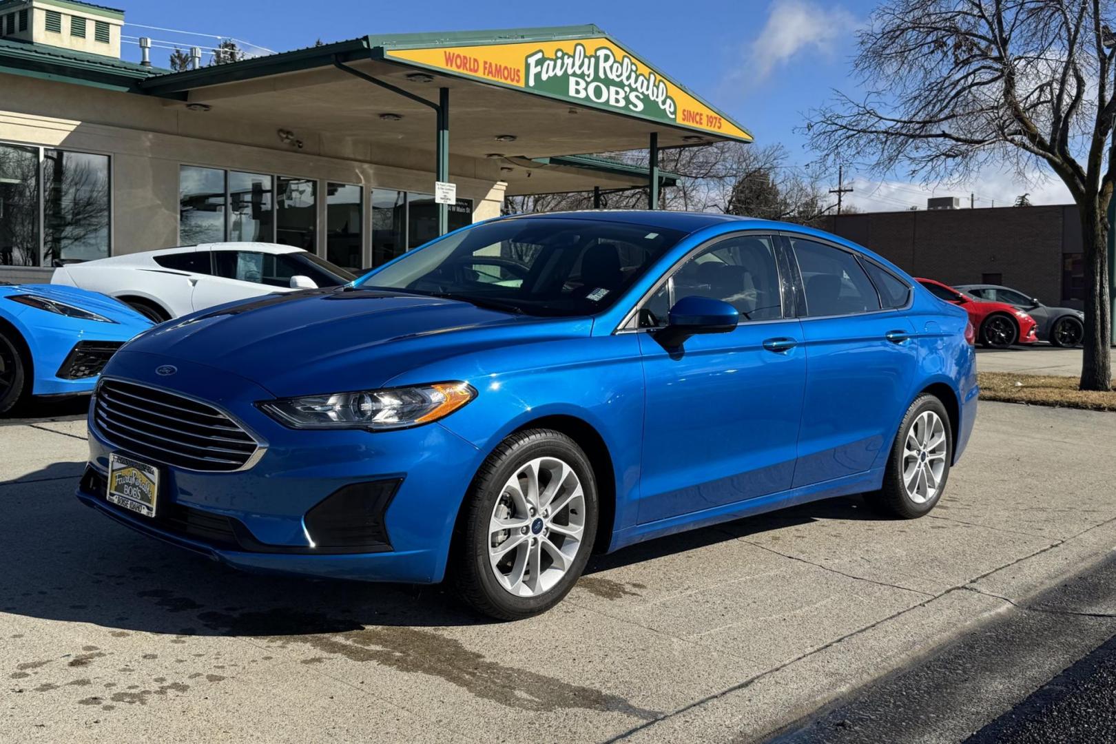 2020 Velocity Blue /Black Ford Fusion Hybrid SE (3FA6P0LU7LR) with an 4 Cyl 2.0 Liter Hybrid engine, Automatic transmission, located at 2304 W. Main St., Boise, ID, 83702, (208) 342-7777, 43.622105, -116.218658 - Low Mileage And Great Fuel Economy! - Photo#0