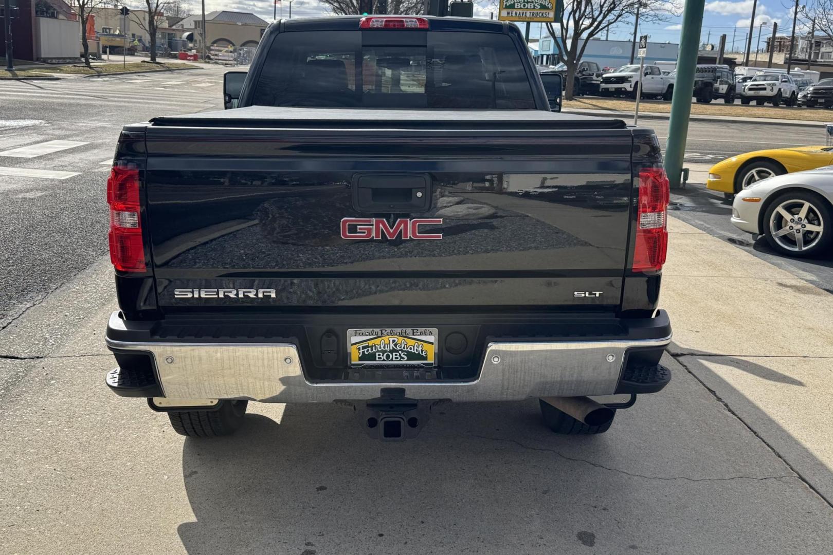 2018 Black /Black GMC Sierra 2500HD SLT (1GT22TEGXJZ) with an V8 6.0 Liter engine, Automatic 6 Speed transmission, located at 2304 W. Main St., Boise, ID, 83702, (208) 342-7777, 43.622105, -116.218658 - Ready To Haul! - Photo#1