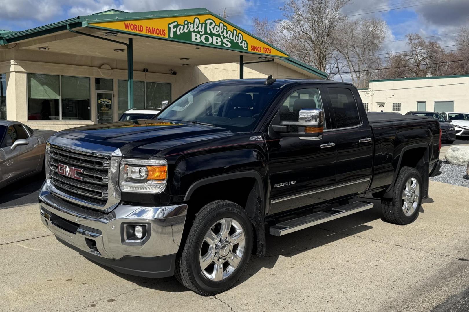 2018 Black /Black GMC Sierra 2500HD SLT (1GT22TEGXJZ) with an V8 6.0 Liter engine, Automatic 6 Speed transmission, located at 2304 W. Main St., Boise, ID, 83702, (208) 342-7777, 43.622105, -116.218658 - Ready To Haul! - Photo#0