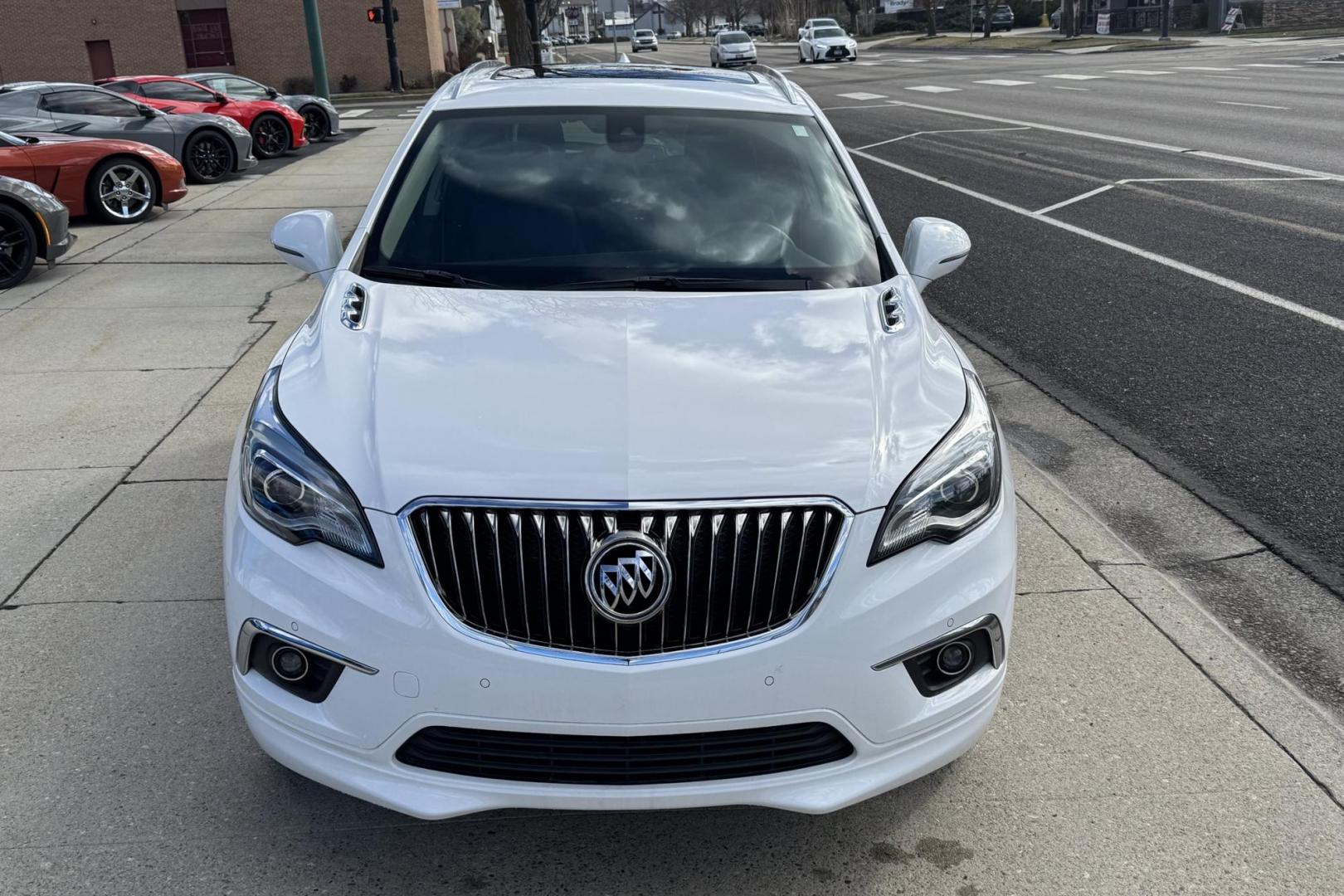 2018 Summit White /Jet Black Buick Envision Premium (LRBFX3SX6JD) with an 4 Cyl 2.0 Liter Turbo engine, Automatic 6 Speed transmission, located at 2304 W. Main St., Boise, ID, 83702, (208) 342-7777, 43.622105, -116.218658 - Well Optioned And Clean! A Lot Of Safety Features Too! - Photo#3