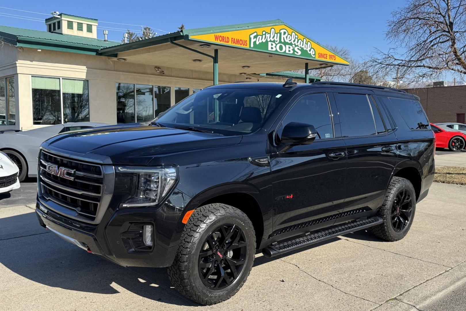 2022 Black /Jet Black/Umber GMC Yukon AT4 (1GKS2CKL9NR) with an V8 6.2 Liter engine, Automatic 10 Speed transmission, located at 2304 W. Main St., Boise, ID, 83702, (208) 342-7777, 43.622105, -116.218658 - Nicely Optioned! - Photo#0